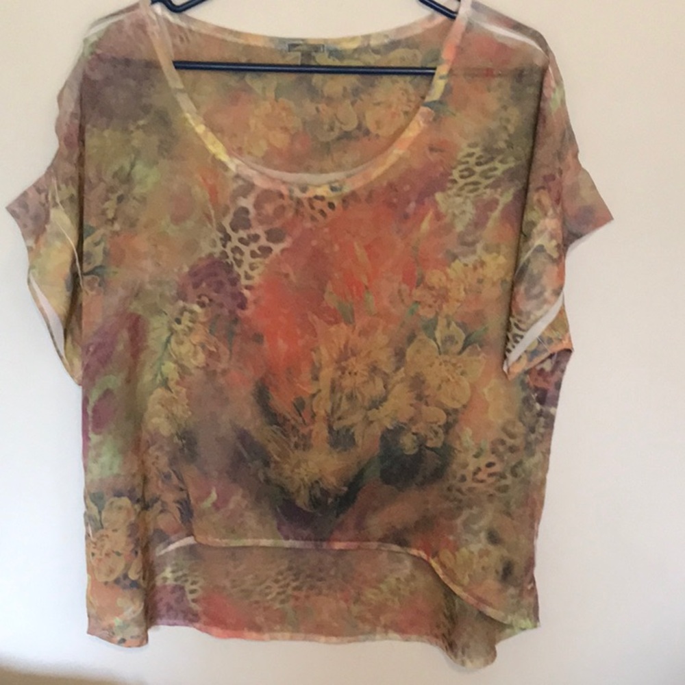 Fall comes to you in this beautiful semi sheer top